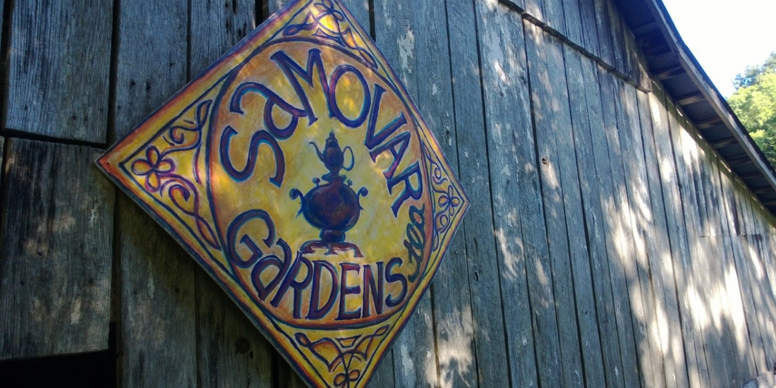 The original Samovar Gardens sign on the Farm 