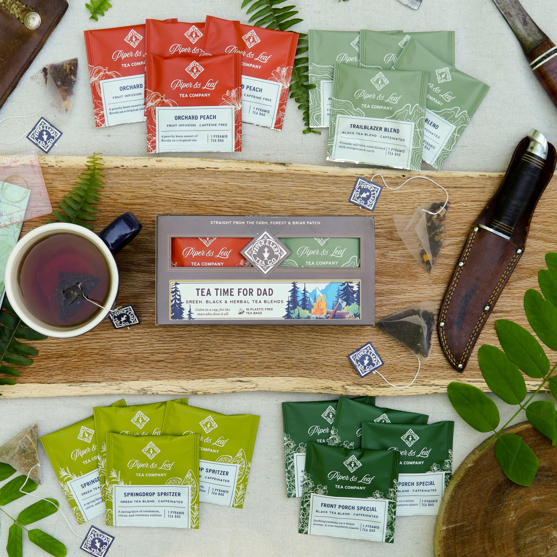 The Piper & Leaf Tea Co. "Tea Time For Dad" box includes 16 individually wrapped tea bags—perfectly arranged with a cup of tea and decorative accents for an ideal Father's Day gift.