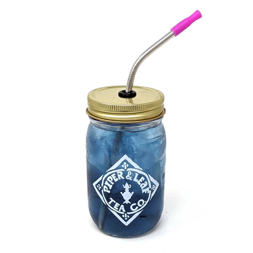 A blue mason jar with a Piper & Leaf Tea Co. Stainless Steel Straws - 12 Pack (8.5").