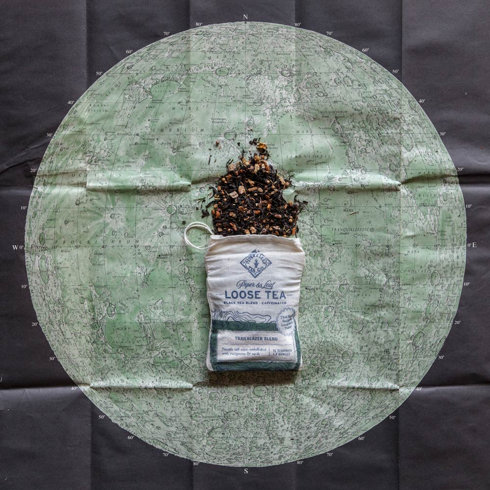 A bag of Trailblazer Blend spilling out over a map of the moon